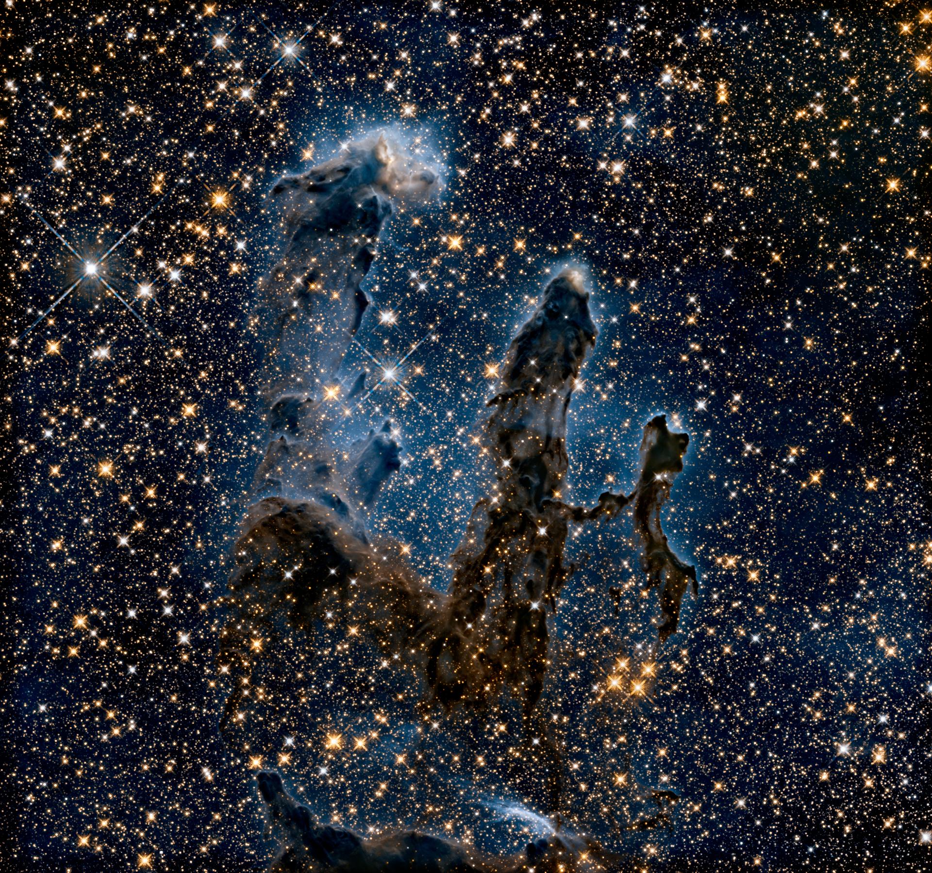Les Piliers de la création, colonnes de gaz où naissent des étoiles